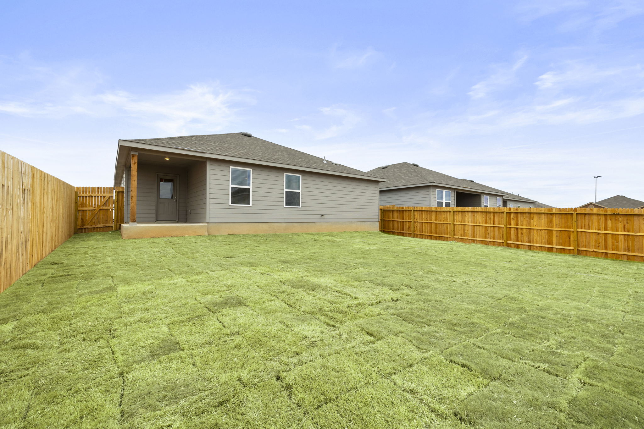 3209 Ridge Place Seguin, TX 78155 - Photo 21 of 23 Rear view of property featuring a fenced backyard and a patio area