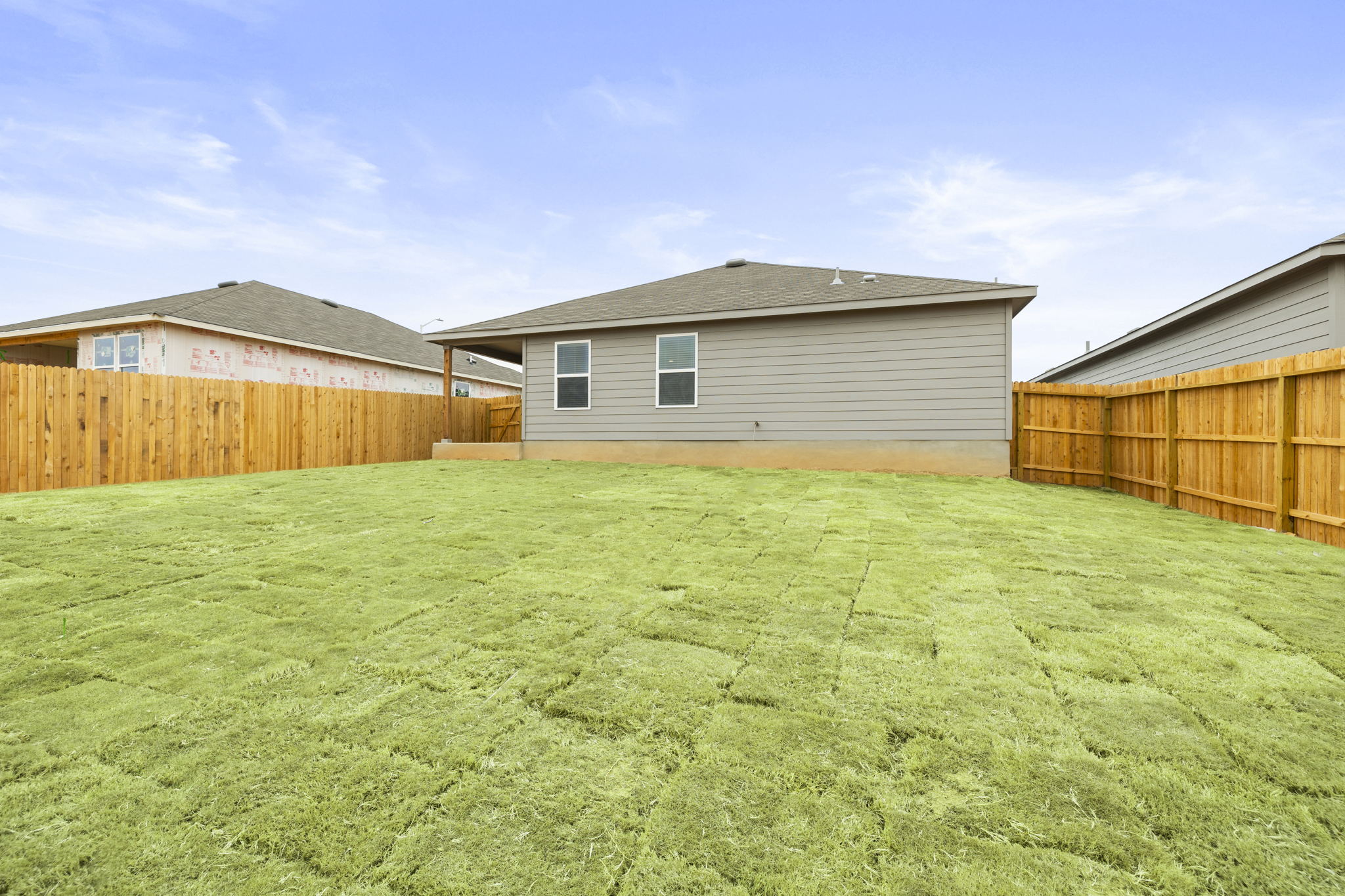 3209 Ridge Place Seguin, TX 78155 - Photo 22 of 23 Back of property featuring a fenced backyard