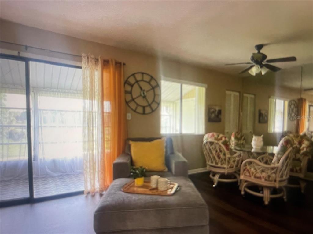 757 Midway Drive, Unit B Ocala, FL 34472 - Photo 18 of 26 a living room with furniture and a window