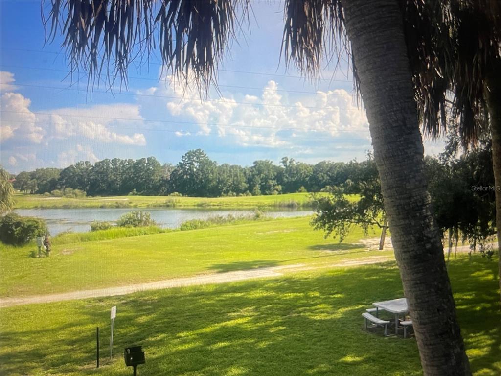 757 Midway Drive, Unit B Ocala, FL 34472 - Photo 25 of 26 a view of an ocean from a balcony