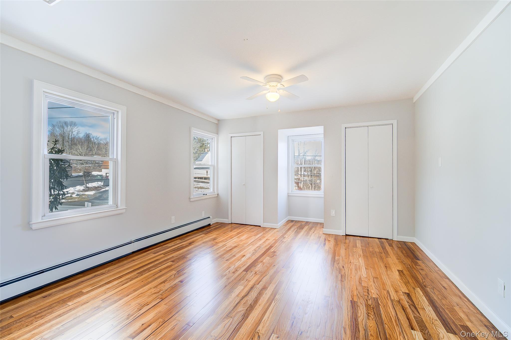 2213 Mt Hope Road, Unit A Middletown, NY 10940 - Photo 19 of 21 a view of an empty room with wooden floor and a window