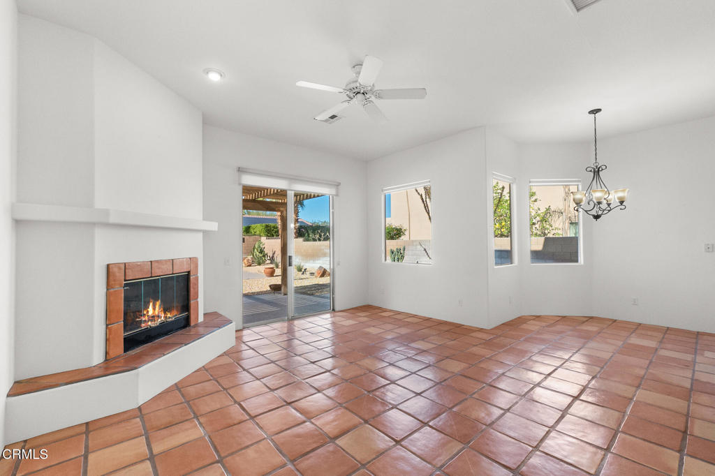67 Tempe Trail Palm Desert, CA 92211 - Photo 11 of 56 a view of an empty room with window and fire place