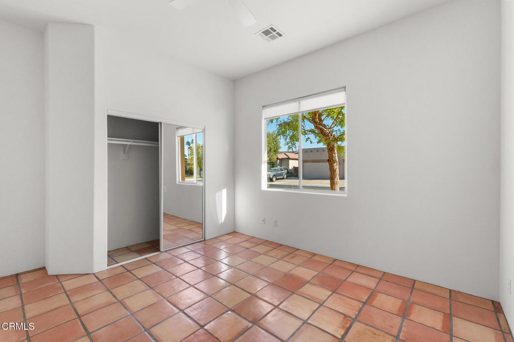 67 Tempe Trail Palm Desert, CA 92211 - Photo 25 of 56 a view of an empty room and window