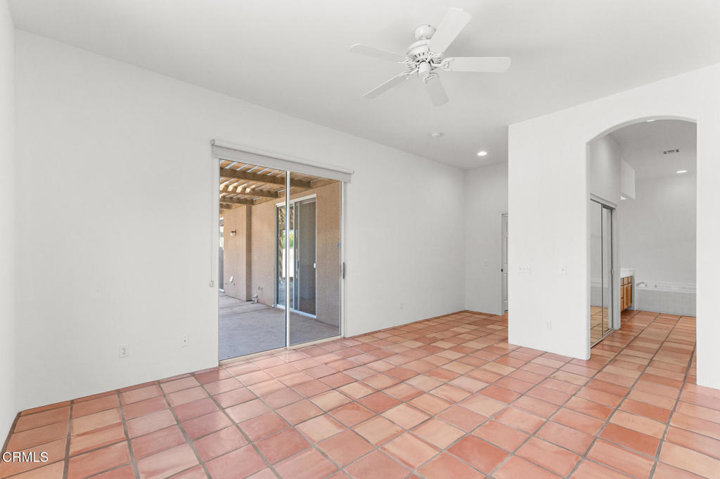 67 Tempe Trail Palm Desert, CA 92211 - Photo 32 of 56 a bedroom with a bed and a view of bathroom
