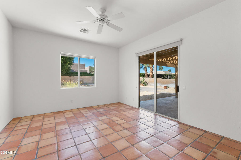 67 Tempe Trail Palm Desert, CA 92211 - Photo 33 of 56 a view of an empty room and window