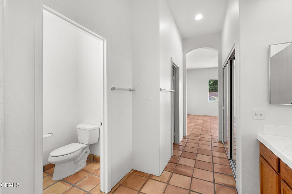 67 Tempe Trail Palm Desert, CA 92211 - Photo 38 of 56 a bathroom with a toilet and a shower