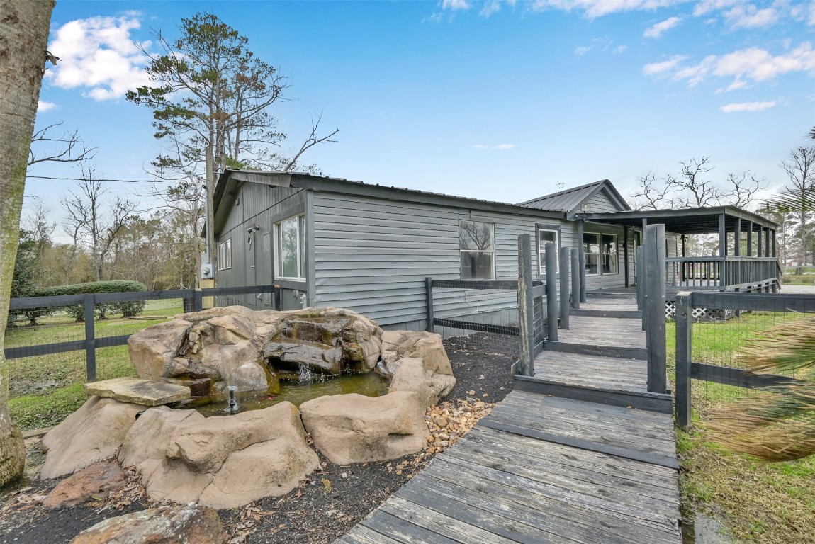 22603 Tuwa Road Tomball, TX 77375 - Photo 5 of 39 a front view of a house with a yard