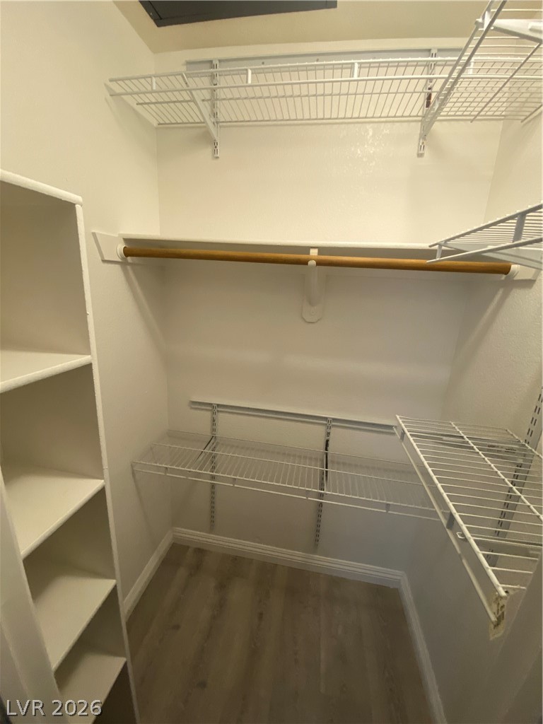 5271 South Lindell Road, Unit 202 Las Vegas, NV 89118 - Photo 22 of 27 Ample storage solutions define this practical and organized walk-in closet.