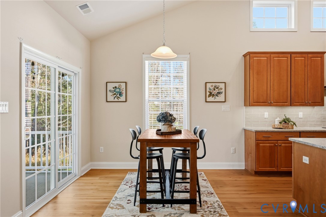 6101 Courage Trail Chester, VA 23831 - Photo 15 of 50 a dining room with furniture and window