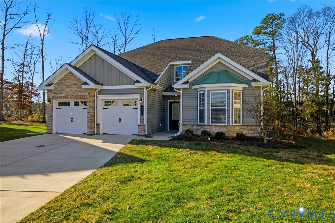 6101 Courage Trail Chester, VA 23831 - Photo 2 of 50 a view of a house with a yard