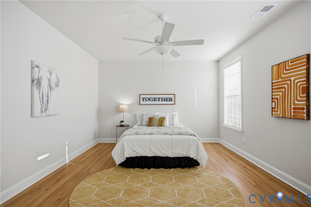 6101 Courage Trail Chester, VA 23831 - Photo 27 of 50 a bedroom with a bed and a window