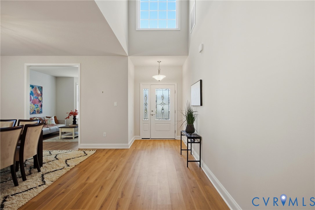 6101 Courage Trail Chester, VA 23831 - Photo 7 of 50 a view of a livingroom with wooden floor and furniture