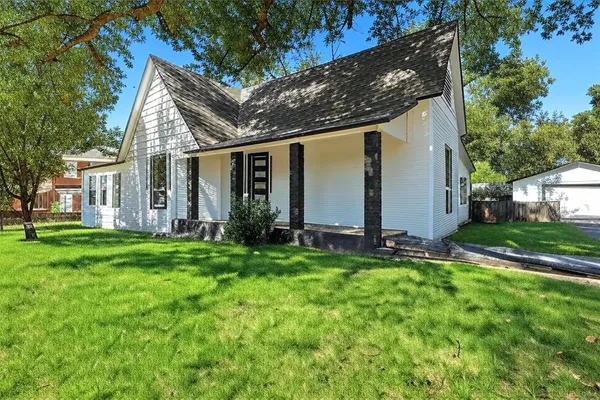 front view of house with a yard