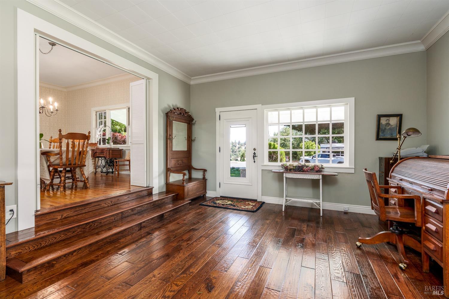 5700 Old River Road Ukiah, CA 95482 - Photo 19 of 56 a living room with furniture and a wooden floor