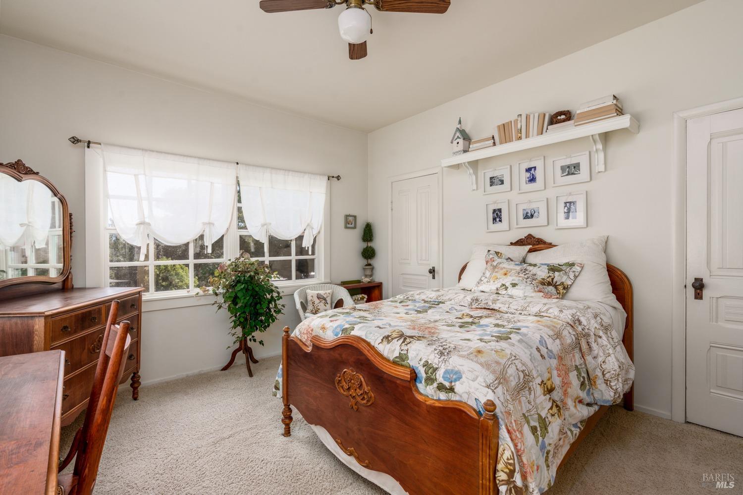 5700 Old River Road Ukiah, CA 95482 - Photo 25 of 56 a bed room with a bed and a large window