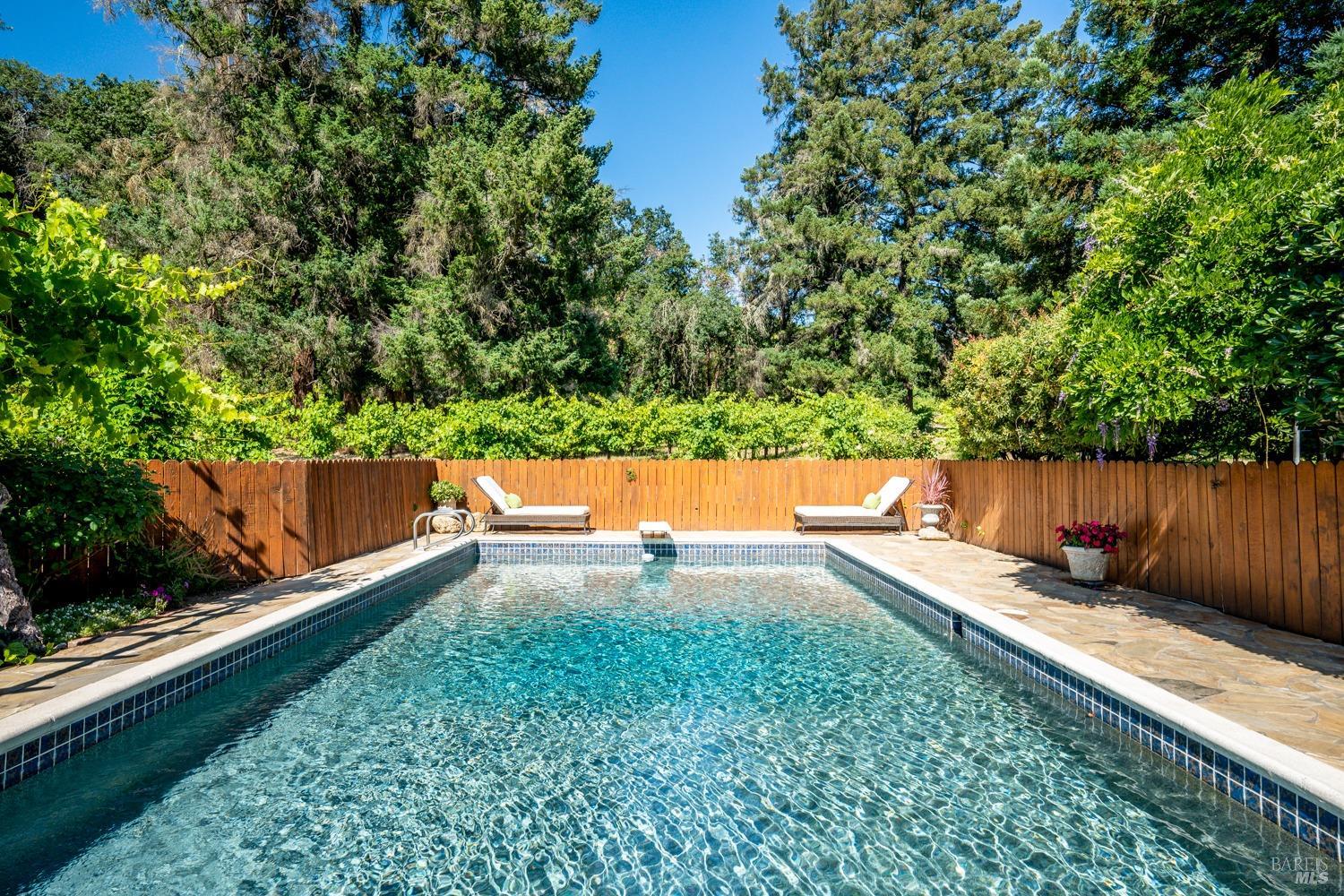 5700 Old River Road Ukiah, CA 95482 - Photo 30 of 56 a view of a backyard with a wooden fence