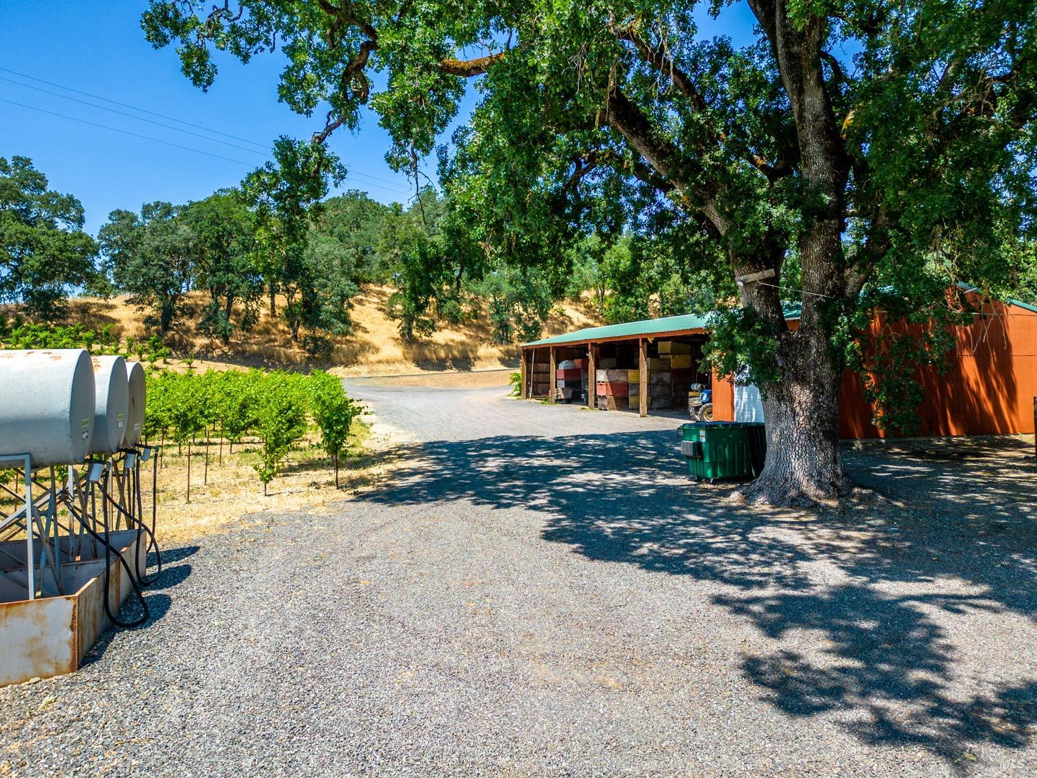 5700 Old River Road Ukiah, CA 95482 - Photo 34 of 56 a view of a house with backyard and sitting area