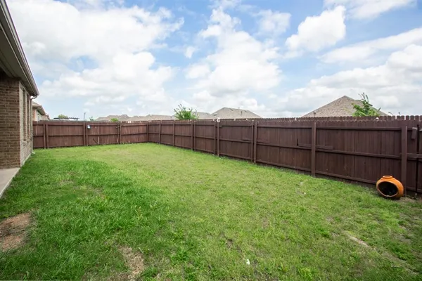 a view of a backyard with a garden
