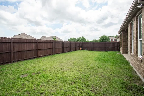 a view of a backyard with a garden