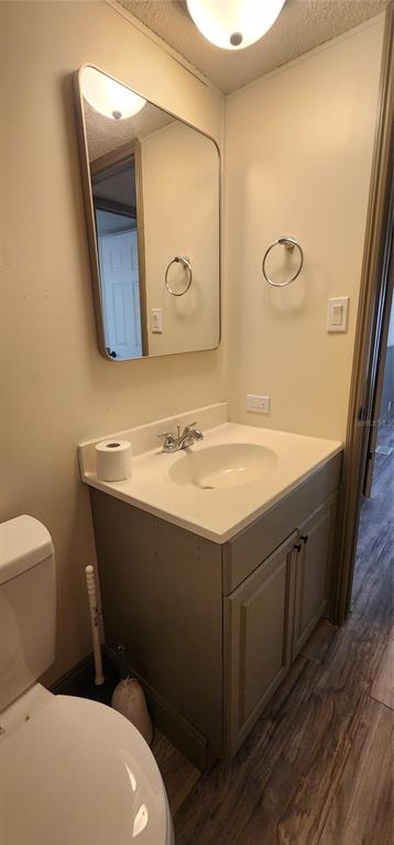 19865 Southwest 5th Place Dunnellon, FL 34431 - Photo 72 of 78 a bathroom with a sink and a mirror