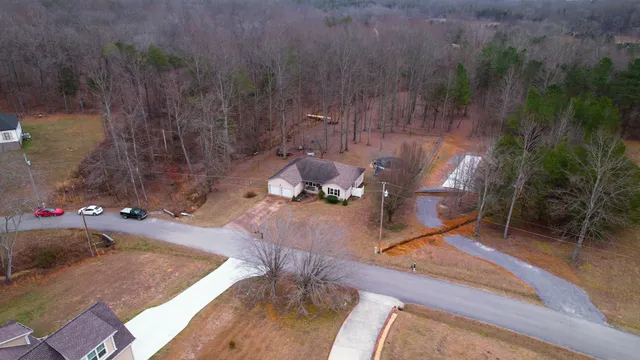 a backyard of a house with lots of green space