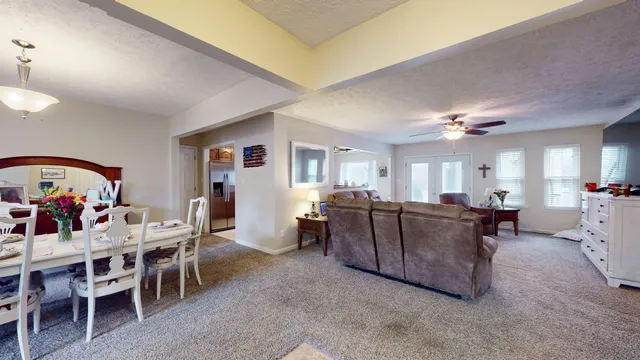 a view of a livingroom with furniture and window