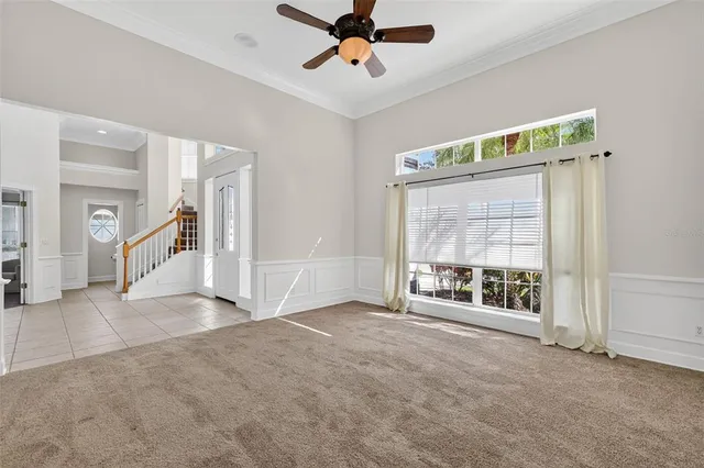 a view of an entryway with wooden floor and a front door