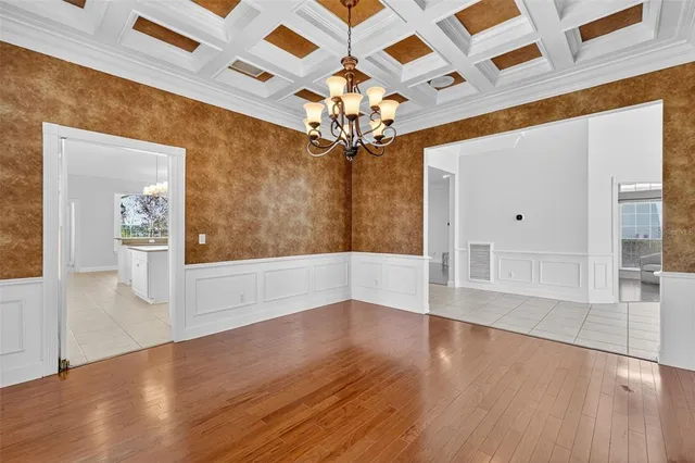 a view of an empty room with a fireplace