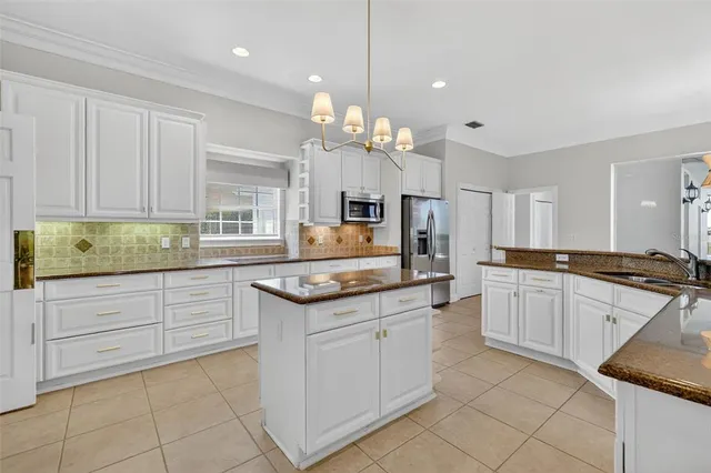 a view of an entryway with a floor to ceiling window