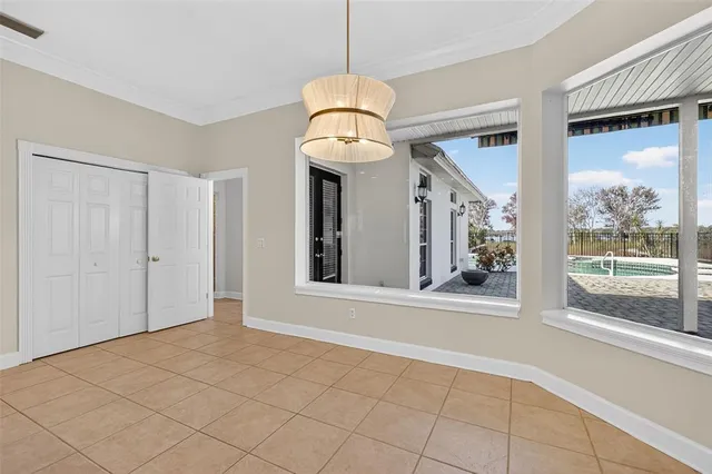 a bathroom with a granite countertop sink a mirror a vanity and a shower
