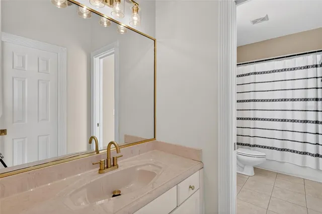 a view of a swimming pool and a yard