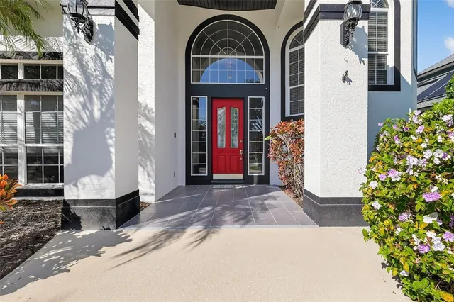 a front view of a house with a garage