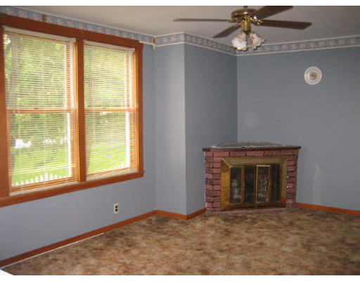 109 Grove Street Clinton, MA 01510 - Photo 5 of 6 a view of an empty room with a window