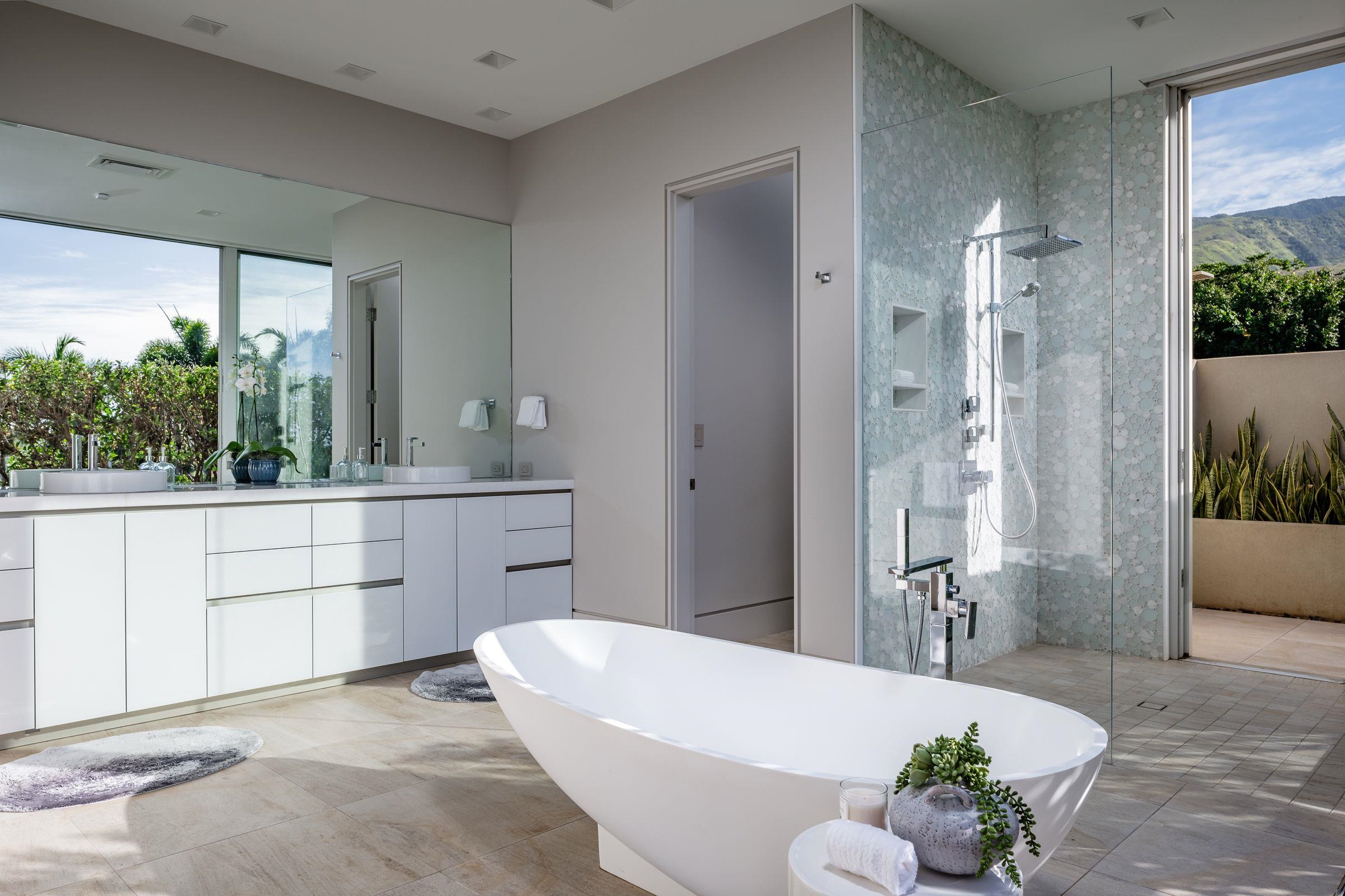 936 Punakea Loop Lahaina, HI 96761 - Photo 19 of 37 a bathroom with a tub shower and mirror