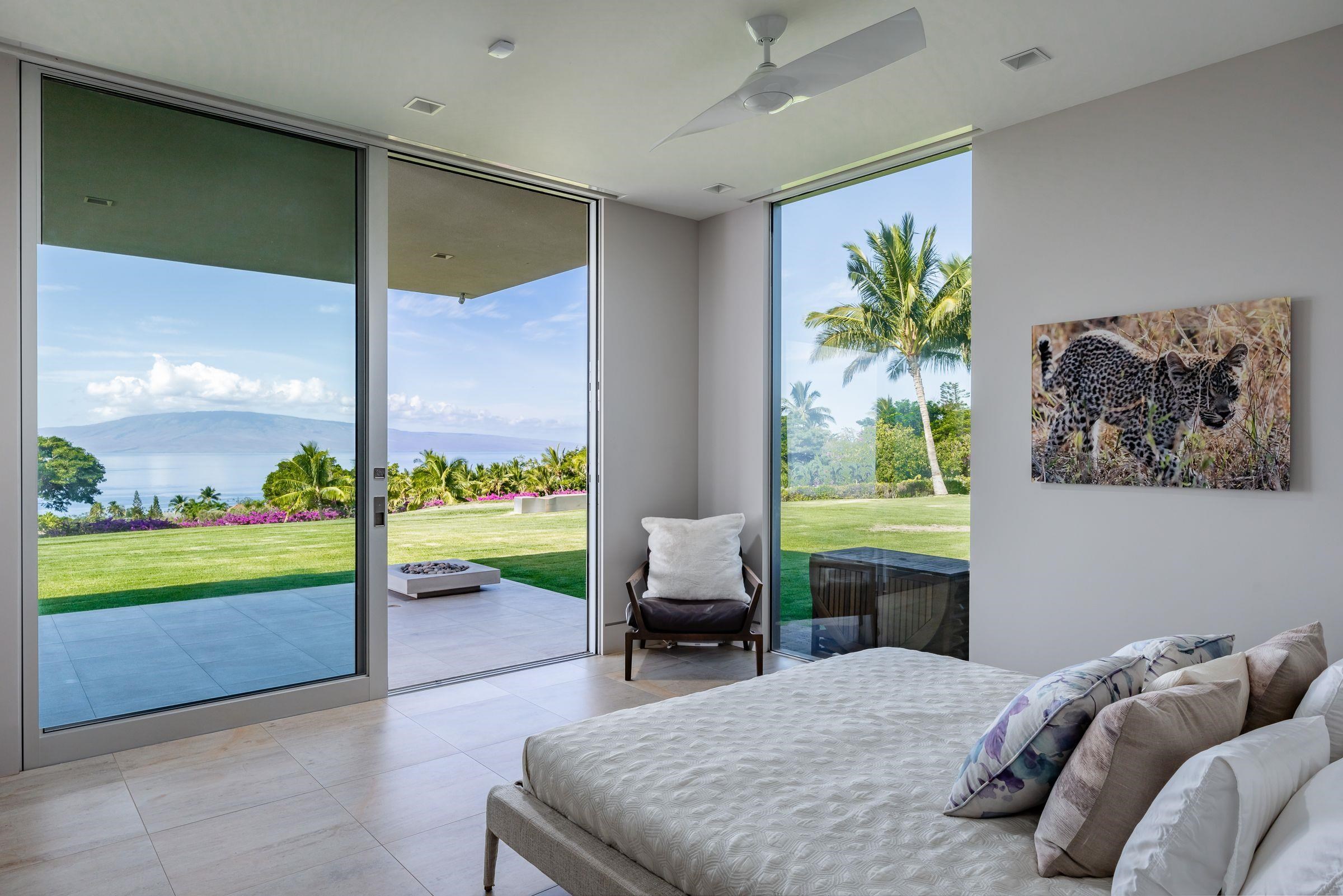 936 Punakea Loop Lahaina, HI 96761 - Photo 22 of 37 a bedroom with a bed table flowerpot and window
