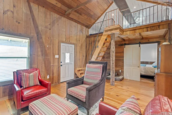 a living room with furniture and a couch