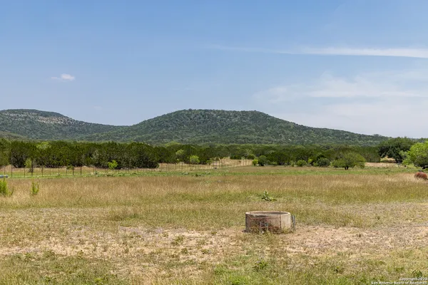 a view of lake with mountain