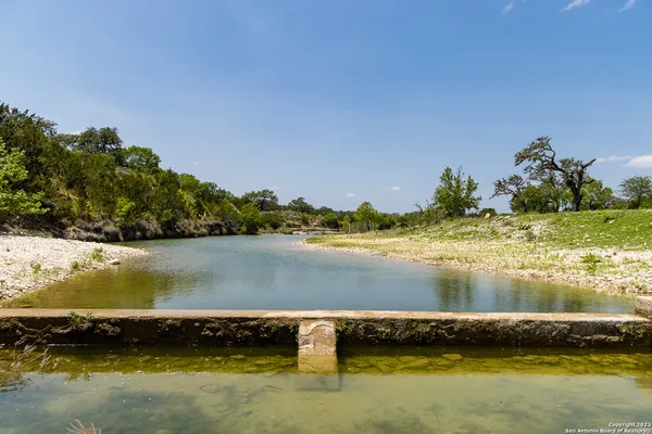 a view of a lake with a houses