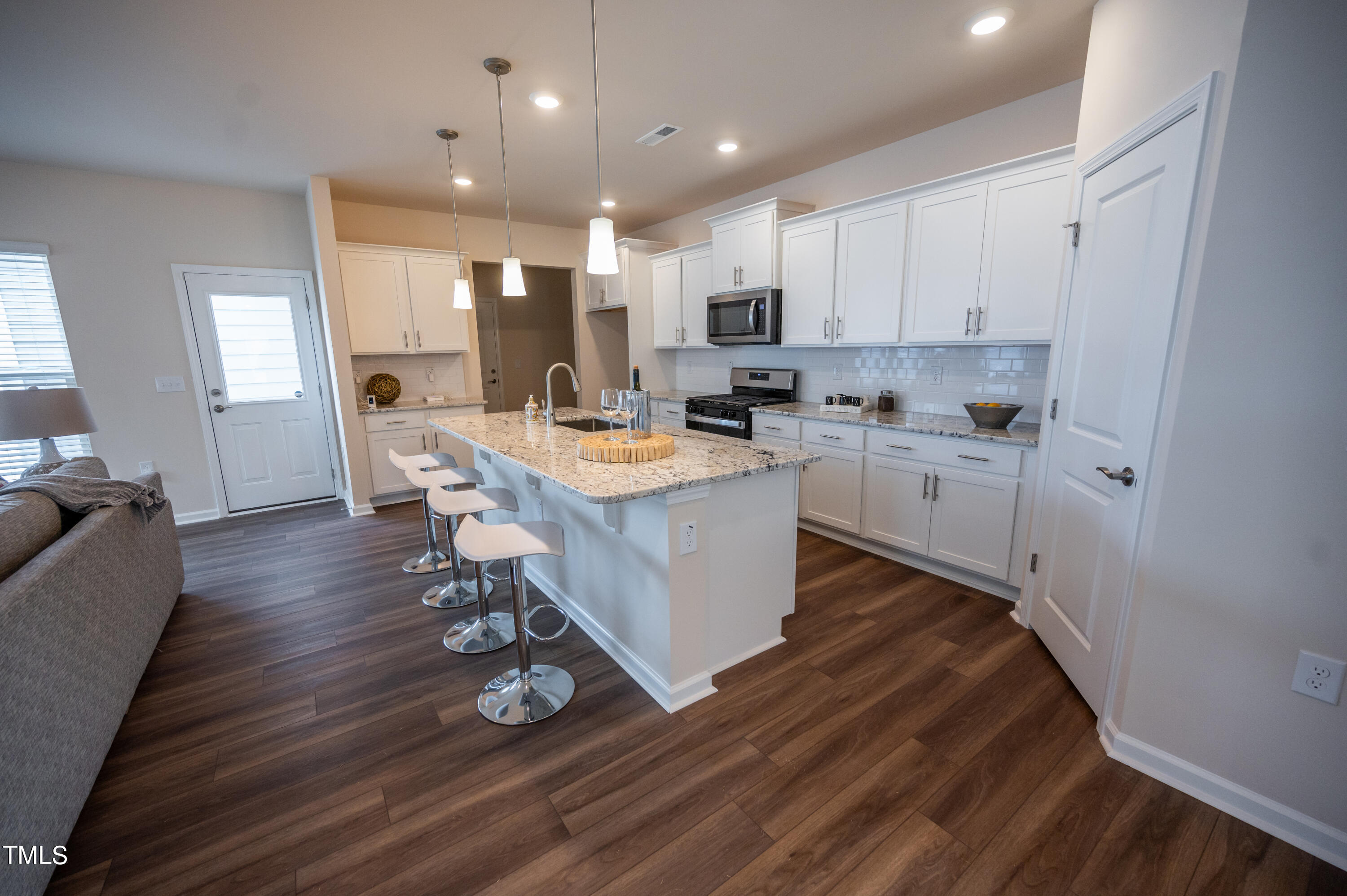 5716 Agrinio Way Raleigh, NC 27603 - Photo 9 of 25 Kitchen