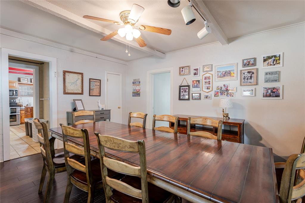 1601 Forum Circle, Unit 156 Graford, TX 76449 - Photo 12 of 28 a view of a dining room with furniture
