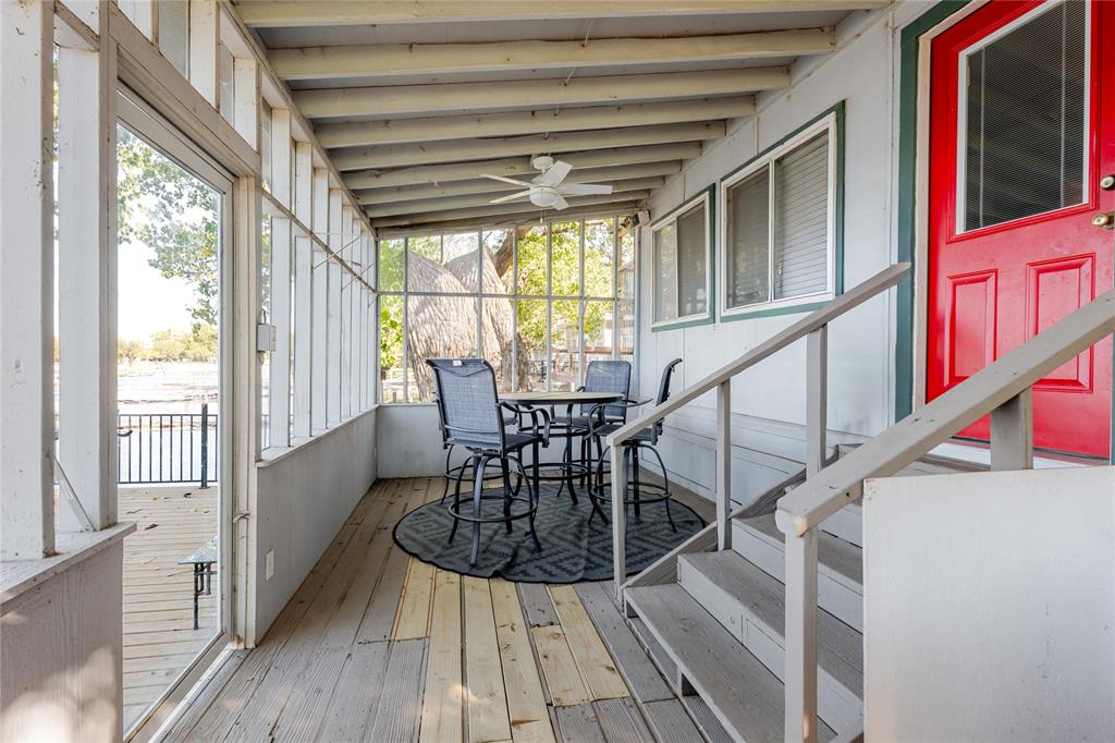 1601 Forum Circle, Unit 156 Graford, TX 76449 - Photo 21 of 28 a view of entryway and hall with wooden floor
