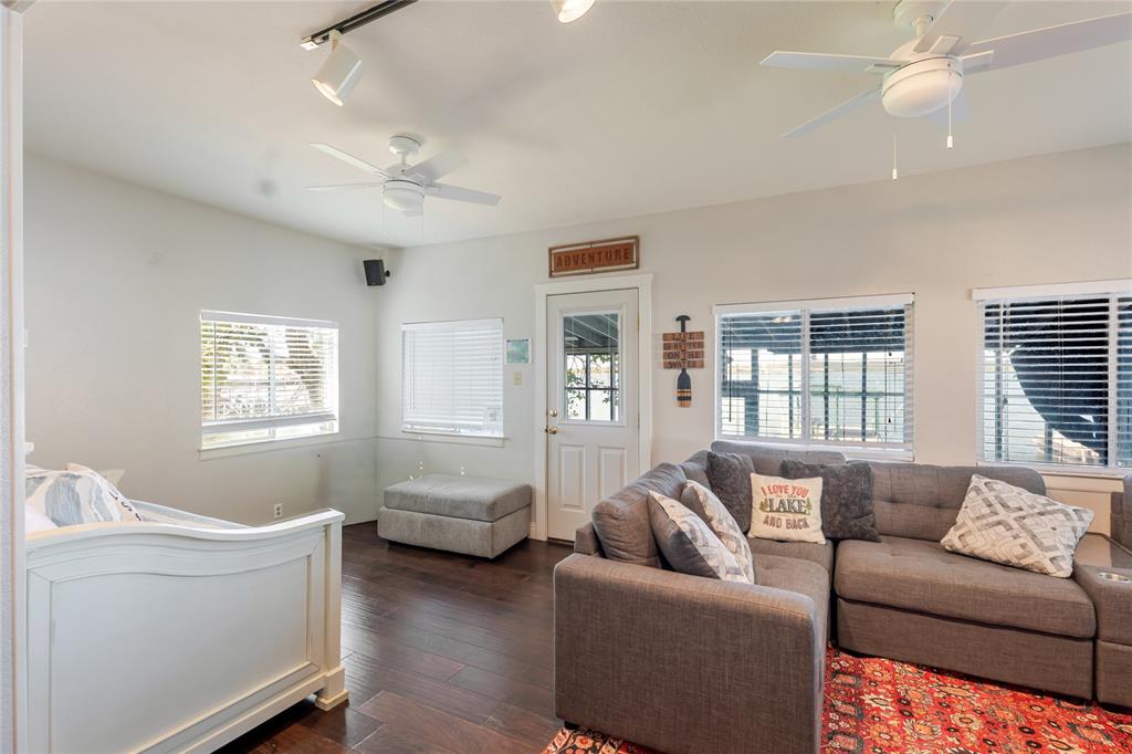 1601 Forum Circle, Unit 156 Graford, TX 76449 - Photo 4 of 28 a living room with furniture and a window