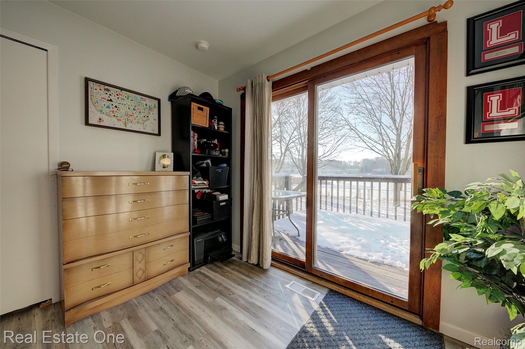 715 Glenwyth Road Brighton, MI 48116 - Photo 29 of 49 Int Doorwall to Back Deck