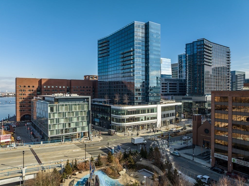 15 Sleeper Street, Unit 302 Boston, MA 02210 - Photo 30 of 35 a front view of a building with glass windows