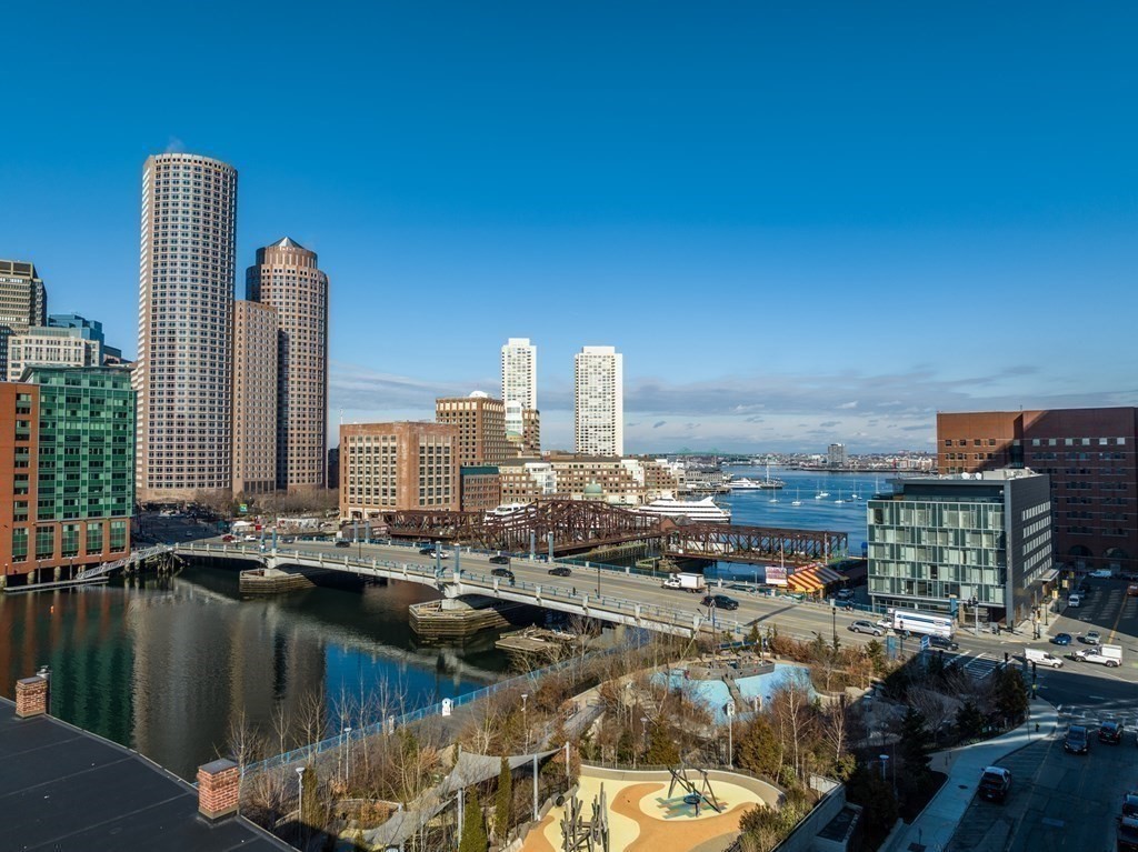 15 Sleeper Street, Unit 302 Boston, MA 02210 - Photo 31 of 35 a view of a city with tall buildings