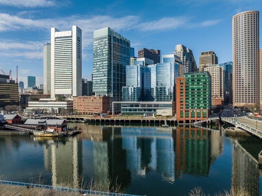 15 Sleeper Street, Unit 302 Boston, MA 02210 - Photo 32 of 35 a view of a lake with tall buildings