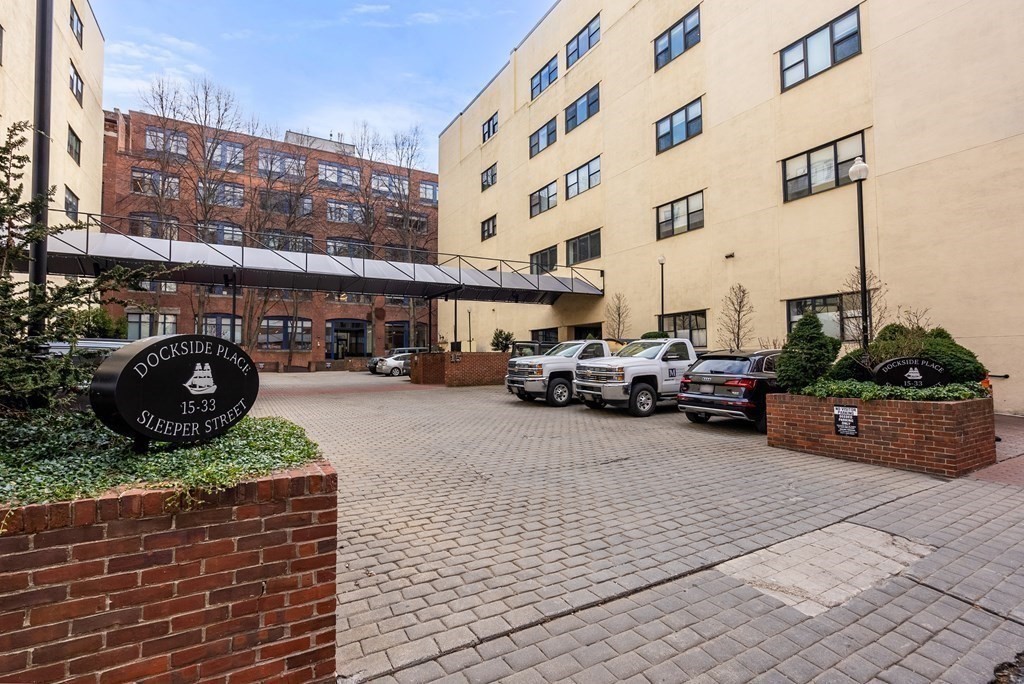 15 Sleeper Street, Unit 302 Boston, MA 02210 - Photo 34 of 35 a car parked on the side of a street
