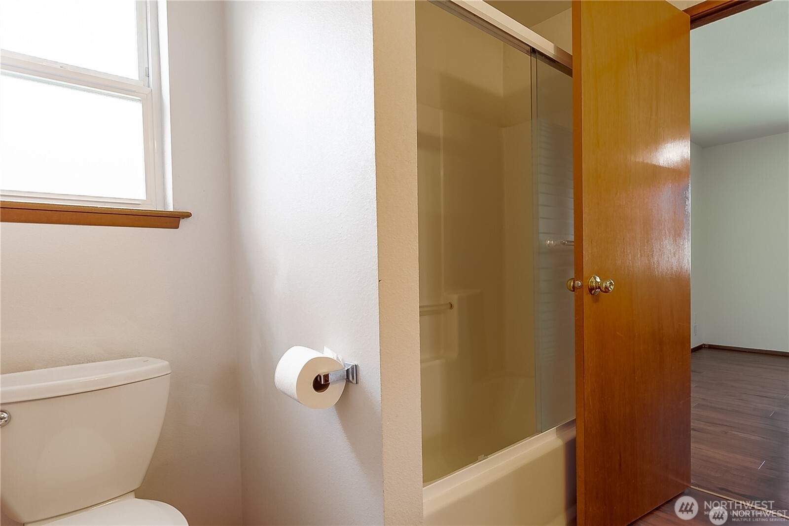 512 North 104th Street Seattle, WA 98133 - Photo 11 of 15 a bathroom with a shower and toilet