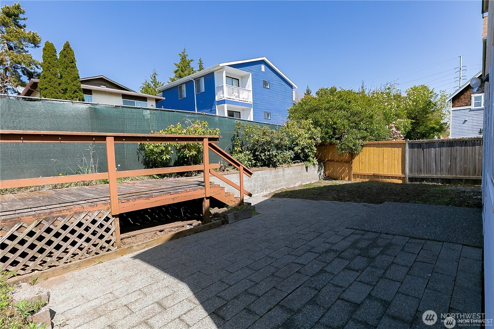 512 North 104th Street Seattle, WA 98133 - Photo 3 of 15 a front view of a house with a yard