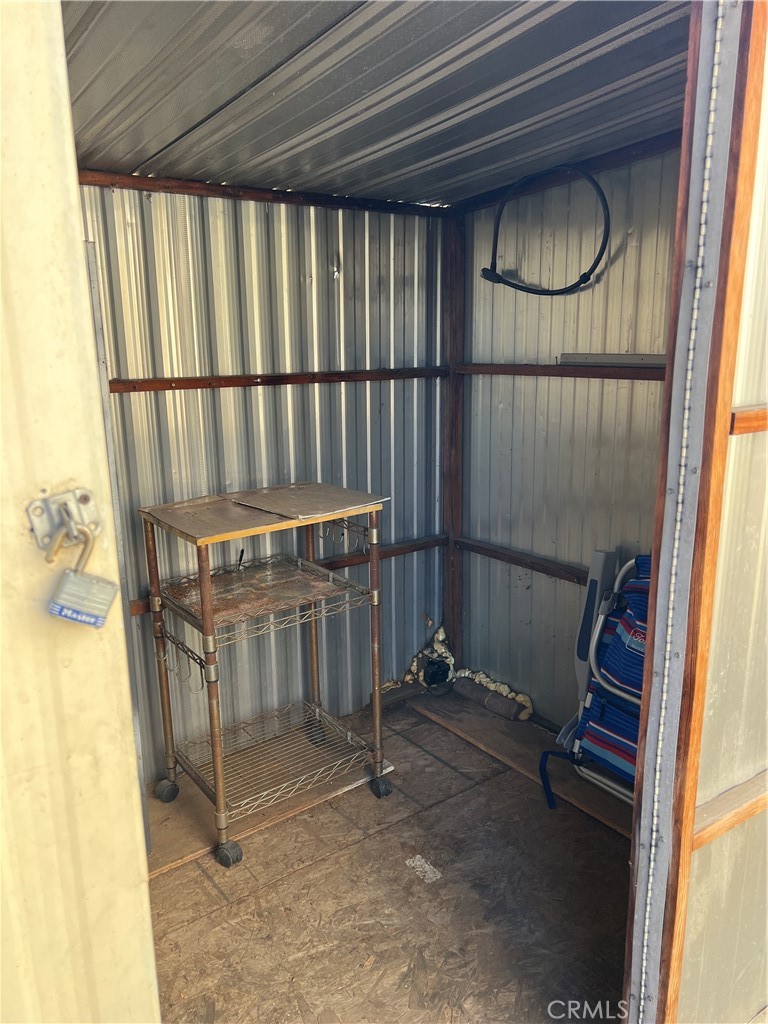 1001 West Lambert Road, Unit 284 La Habra, CA 90631 - Photo 11 of 28 a view of a room with wooden floor and windows